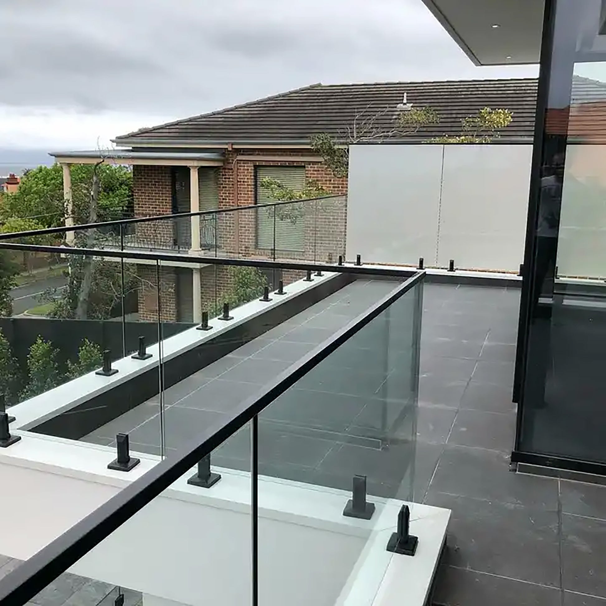 Black Matte Stainless Steel Glass Spigot Balustrade with Leveling Glass Railing  (G1100-BLK) - SHEMONICO